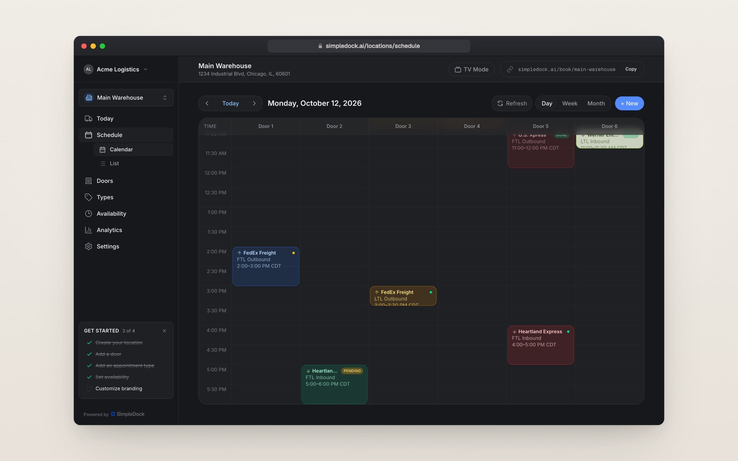The day schedule in dark mode, with appointments in colored blocks across dock doors
